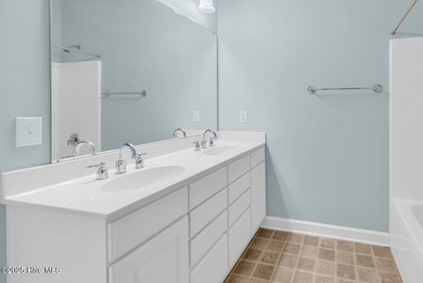 Welcome to this desirable first-floor condo located along the on Crow Creek Golf Club in North Carolina - for sale on GolfHomes.com, golf home, golf lot