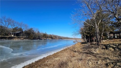 Welcome to your serene lakeside retreat! This beautiful property on Sugar Valley Lakes Golf Course in Kansas - for sale on GolfHomes.com, golf home, golf lot