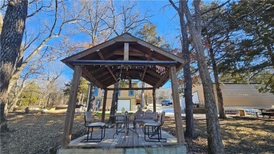 Welcome to your serene lakeside retreat! This beautiful property on Sugar Valley Lakes Golf Course in Kansas - for sale on GolfHomes.com, golf home, golf lot