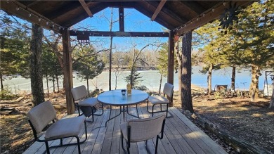 Welcome to your serene lakeside retreat! This beautiful property on Sugar Valley Lakes Golf Course in Kansas - for sale on GolfHomes.com, golf home, golf lot