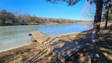 Welcome to your serene lakeside retreat! This beautiful property on Sugar Valley Lakes Golf Course in Kansas - for sale on GolfHomes.com, golf home, golf lot