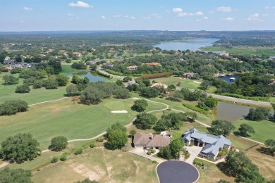 Nestled on a beautifully landscaped lot overlooking the Palmer on Palmer Lakeside At Barton Creek in Texas - for sale on GolfHomes.com, golf home, golf lot