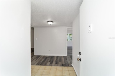 Seller to pay ONE FULL YEAR OF CONDO FEES on this freshly on Country Club At Silver Springs Shores in Florida - for sale on GolfHomes.com, golf home, golf lot