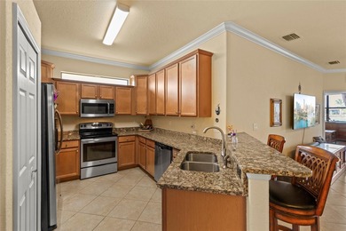 Wake up each day to calming water views in this beautifully on River Strand Golf and Country Club At Heritage Harbour  in Florida - for sale on GolfHomes.com, golf home, golf lot