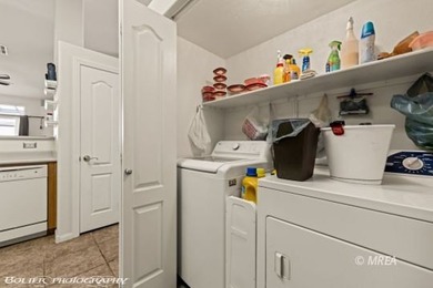 Welcome to 1221 Pebble Beach Dr in Sunset Greens, a gated golf on CasaBlanca Resort and Casino in Nevada - for sale on GolfHomes.com, golf home, golf lot