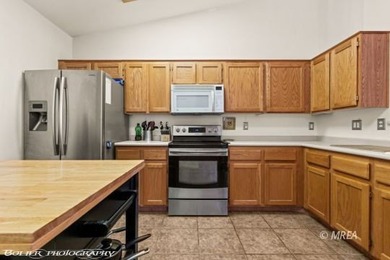 Welcome to 1221 Pebble Beach Dr in Sunset Greens, a gated golf on CasaBlanca Resort and Casino in Nevada - for sale on GolfHomes.com, golf home, golf lot