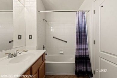 Welcome to 1221 Pebble Beach Dr in Sunset Greens, a gated golf on CasaBlanca Resort and Casino in Nevada - for sale on GolfHomes.com, golf home, golf lot