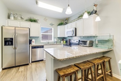 This spacious and well-appointed vacation property is a short on Palmilla Beach Golf Club in Texas - for sale on GolfHomes.com, golf home, golf lot