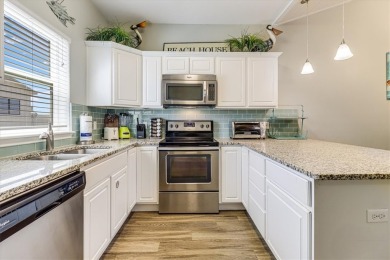 This spacious and well-appointed vacation property is a short on Palmilla Beach Golf Club in Texas - for sale on GolfHomes.com, golf home, golf lot