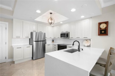 Step off of your private elevator and directly into this on West Bay Beach and Golf Club in Florida - for sale on GolfHomes.com, golf home, golf lot