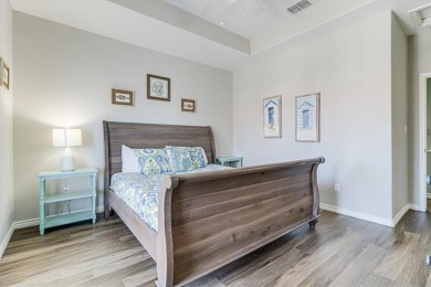 This spacious and well-appointed vacation property is a short on Palmilla Beach Golf Club in Texas - for sale on GolfHomes.com, golf home, golf lot