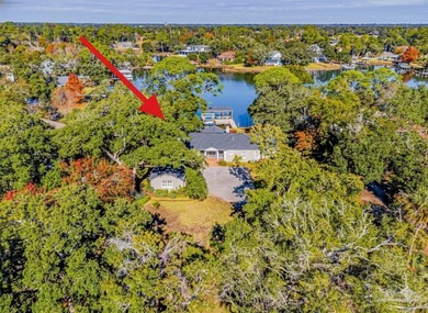 Have you ever dreamed of owning a true waterfront oasis on Pensacola Country Club in Florida - for sale on GolfHomes.com, golf home, golf lot