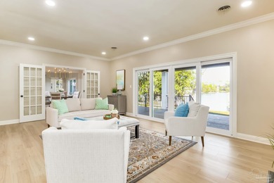 Have you ever dreamed of owning a true waterfront oasis on Pensacola Country Club in Florida - for sale on GolfHomes.com, golf home, golf lot