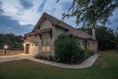 Tucked at the end of a quiet cul-de-sac, this thoughtfully on Apple Rock Golf Course - Horseshoe Bay in Texas - for sale on GolfHomes.com, golf home, golf lot