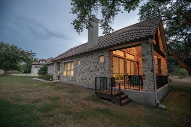 Tucked at the end of a quiet cul-de-sac, this thoughtfully on Apple Rock Golf Course - Horseshoe Bay in Texas - for sale on GolfHomes.com, golf home, golf lot