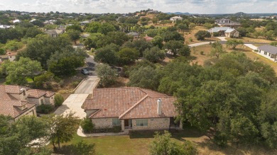 Tucked at the end of a quiet cul-de-sac, this thoughtfully on Apple Rock Golf Course - Horseshoe Bay in Texas - for sale on GolfHomes.com, golf home, golf lot