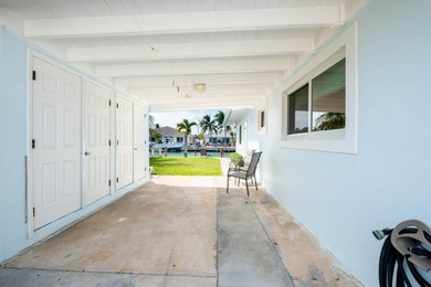 If you need more dockage than most half duplexes in Key Colony on Key Colony Beach Golf Course in Florida - for sale on GolfHomes.com, golf home, golf lot