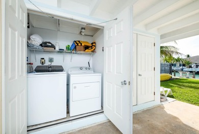 If you need more dockage than most half duplexes in Key Colony on Key Colony Beach Golf Course in Florida - for sale on GolfHomes.com, golf home, golf lot