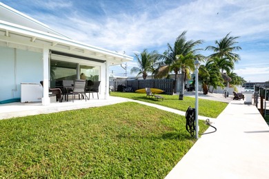 If you need more dockage than most half duplexes in Key Colony on Key Colony Beach Golf Course in Florida - for sale on GolfHomes.com, golf home, golf lot