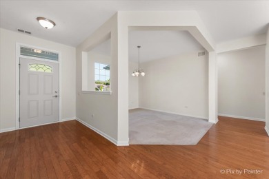 Step into this well-cared-for Mackinac model, freshly painted on Whisper Creek Golf Club in Illinois - for sale on GolfHomes.com, golf home, golf lot