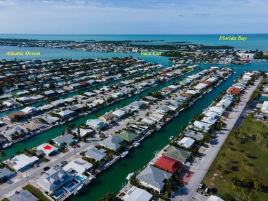 If you need more dockage than most half duplexes in Key Colony on Key Colony Beach Golf Course in Florida - for sale on GolfHomes.com, golf home, golf lot