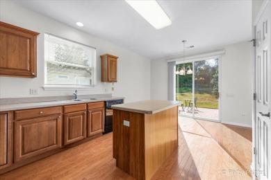 Step into this well-cared-for Mackinac model, freshly painted on Whisper Creek Golf Club in Illinois - for sale on GolfHomes.com, golf home, golf lot