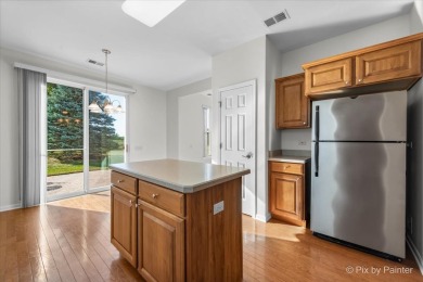 Step into this well-cared-for Mackinac model, freshly painted on Whisper Creek Golf Club in Illinois - for sale on GolfHomes.com, golf home, golf lot