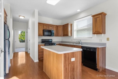 Step into this well-cared-for Mackinac model, freshly painted on Whisper Creek Golf Club in Illinois - for sale on GolfHomes.com, golf home, golf lot