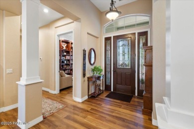 Welcome to this stunning single-level home nestled in The Dells on Prescott Lakes Golf and Country Club in Arizona - for sale on GolfHomes.com, golf home, golf lot