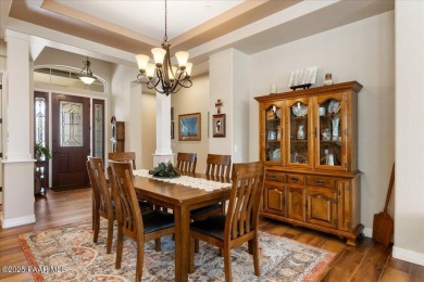 Welcome to this stunning single-level home nestled in The Dells on Prescott Lakes Golf and Country Club in Arizona - for sale on GolfHomes.com, golf home, golf lot