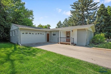 Charming home in the heart of Spearfish! Located just blocks on Spearfish Canyon Country Club in South Dakota - for sale on GolfHomes.com, golf home, golf lot