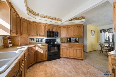 Charming home in the heart of Spearfish! Located just blocks on Spearfish Canyon Country Club in South Dakota - for sale on GolfHomes.com, golf home, golf lot