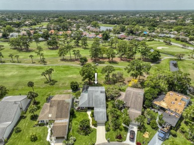 Centrally located and on a cul-de-sac this bright home welcomes on Eastpointe Country Club in Florida - for sale on GolfHomes.com, golf home, golf lot