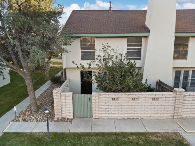 This beautifully maintained townhome offers a perfect blend of on Arroyo Del Oso Golf Course in New Mexico - for sale on GolfHomes.com, golf home, golf lot