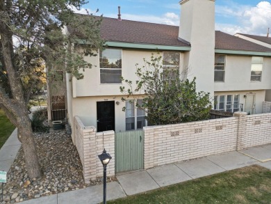 This beautifully maintained townhome offers a perfect blend of on Arroyo Del Oso Golf Course in New Mexico - for sale on GolfHomes.com, golf home, golf lot