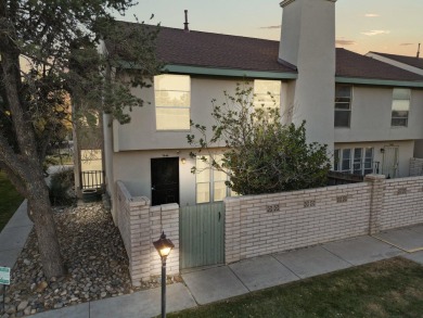 This beautifully maintained townhome offers a perfect blend of on Arroyo Del Oso Golf Course in New Mexico - for sale on GolfHomes.com, golf home, golf lot