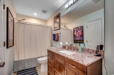 Versatility is the key to this beautiful, traditional two-story on TPC of Myrtle Beach in South Carolina - for sale on GolfHomes.com, golf home, golf lot