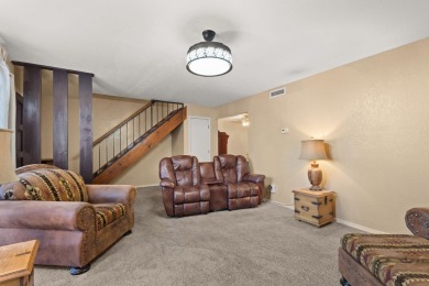 This beautifully maintained townhome offers a perfect blend of on Arroyo Del Oso Golf Course in New Mexico - for sale on GolfHomes.com, golf home, golf lot