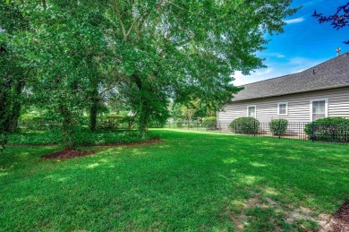 Versatility is the key to this beautiful, traditional two-story on TPC of Myrtle Beach in South Carolina - for sale on GolfHomes.com, golf home, golf lot