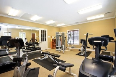 Versatility is the key to this beautiful, traditional two-story on TPC of Myrtle Beach in South Carolina - for sale on GolfHomes.com, golf home, golf lot