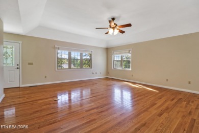 Lake-view living on a wooded acre-this 1,800 SF, single-level on Lake Tansi Village Country Club in Tennessee - for sale on GolfHomes.com, golf home, golf lot