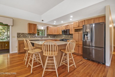 Lake-view living on a wooded acre-this 1,800 SF, single-level on Lake Tansi Village Country Club in Tennessee - for sale on GolfHomes.com, golf home, golf lot