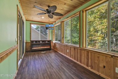 Lake-view living on a wooded acre-this 1,800 SF, single-level on Lake Tansi Village Country Club in Tennessee - for sale on GolfHomes.com, golf home, golf lot