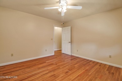 Lake-view living on a wooded acre-this 1,800 SF, single-level on Lake Tansi Village Country Club in Tennessee - for sale on GolfHomes.com, golf home, golf lot