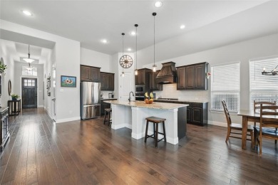 Discover nearly 3,000 sq ft of beautifully maintained on The Golf Club At Champions Circle in Texas - for sale on GolfHomes.com, golf home, golf lot
