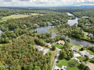 Lake-view living on a wooded acre-this 1,800 SF, single-level on Lake Tansi Village Country Club in Tennessee - for sale on GolfHomes.com, golf home, golf lot