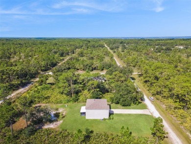 Welcome to your dream home in the peaceful community of Indian on Indian Lake Estates Golf and Country Club in Florida - for sale on GolfHomes.com, golf home, golf lot