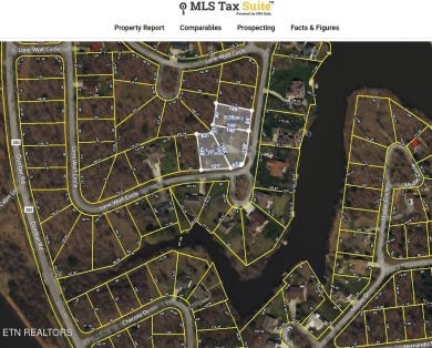 Lake-view living on a wooded acre-this 1,800 SF, single-level on Lake Tansi Village Country Club in Tennessee - for sale on GolfHomes.com, golf home, golf lot