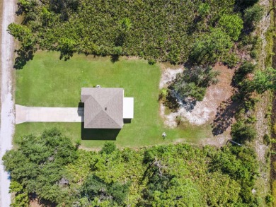 Welcome to your dream home in the peaceful community of Indian on Indian Lake Estates Golf and Country Club in Florida - for sale on GolfHomes.com, golf home, golf lot