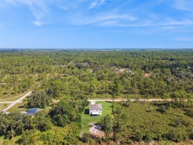 Welcome to your dream home in the peaceful community of Indian on Indian Lake Estates Golf and Country Club in Florida - for sale on GolfHomes.com, golf home, golf lot